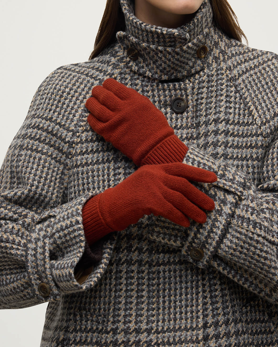 Model wearing Johnstons of Elgin AW25 Knitted Accessories Red Cashmere Gloves with Turnback Cuffs HBJ03523SG4463ONE