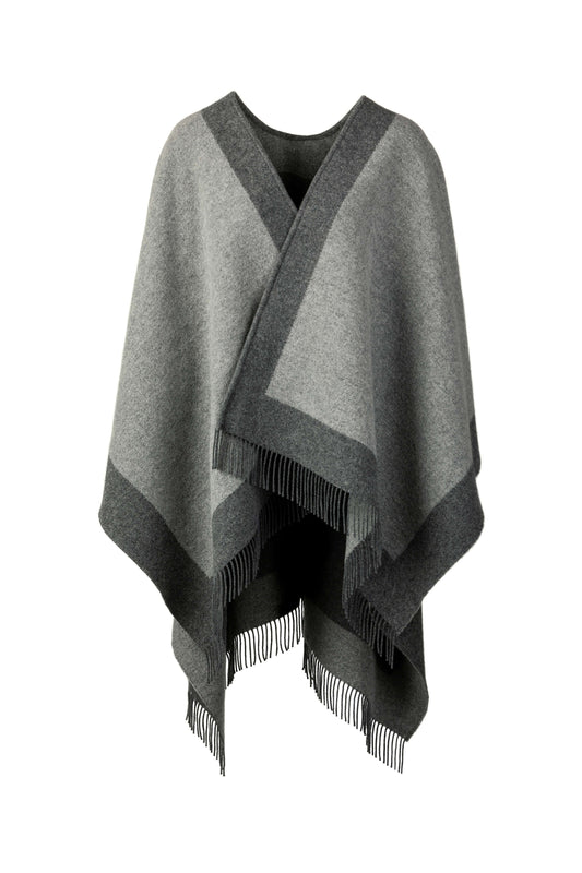 Johnstons of Elgin Merino Wool Cape with Contrast Border in Grey worn over Navy hoodie & Joggers on a grey background TD000230RU7369ONE