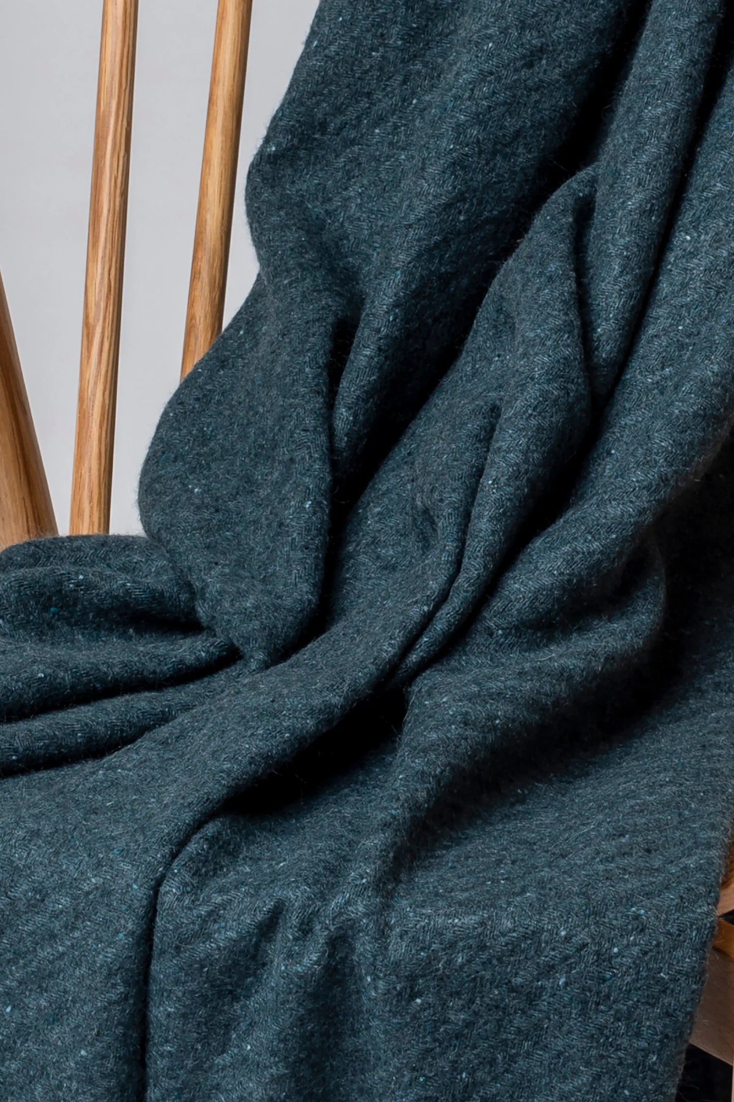 2025 Johnstons of Elgin Interiors Collection Storm Lofty Twill Cashmere Throw on a grey background WAC02308RU7654ONE