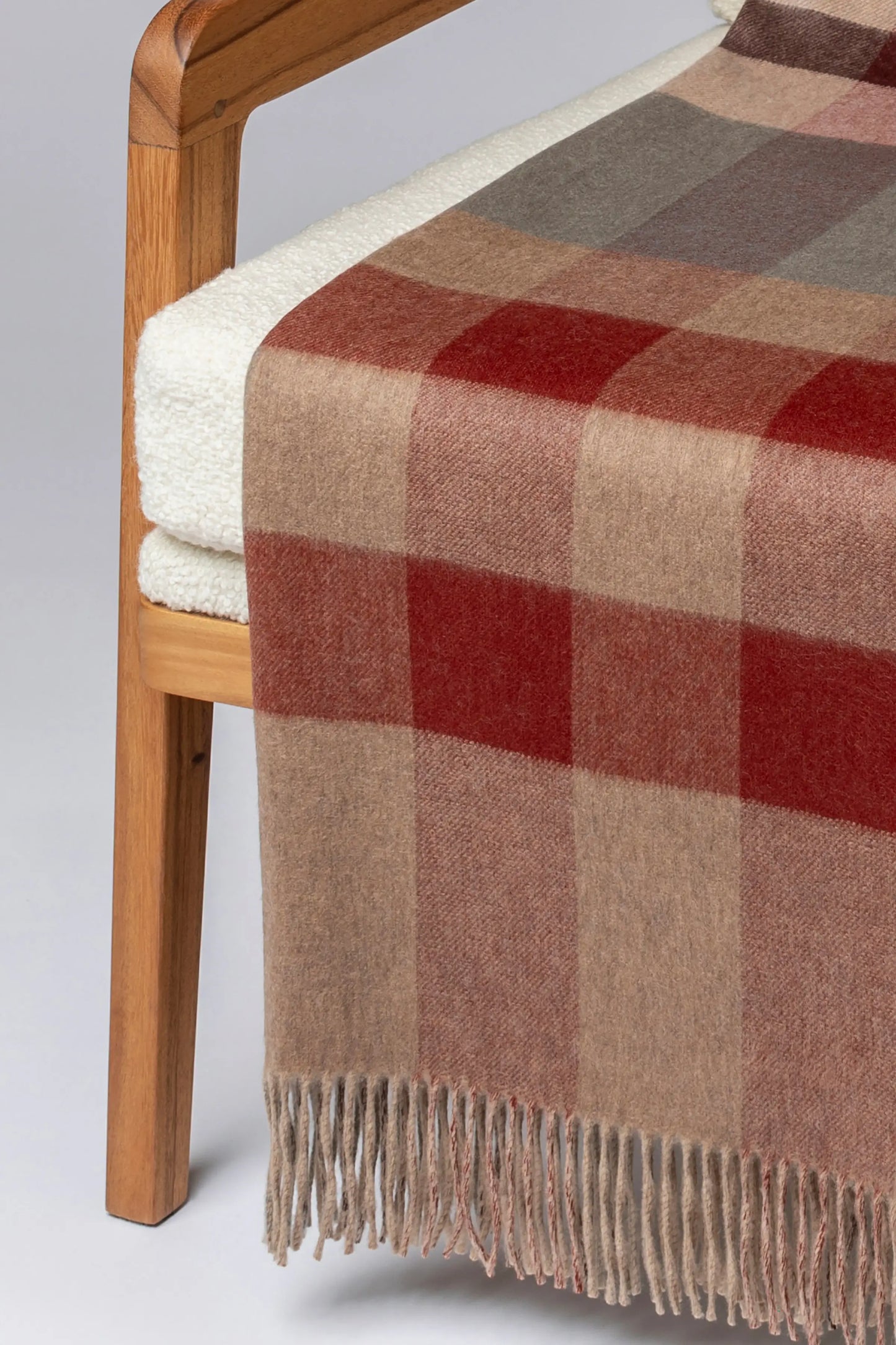 2025 Johnstons of Elgin Interiors Collection Rowan Check Reversible Cashmere Throw on a grey background WA000013RU7605ONE