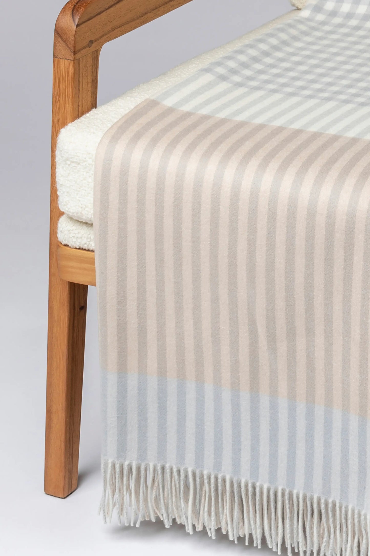 2025 Johnstons of Elgin Interiors Collection Heron Check Reversible Cashmere Throw on a grey background WA000013RU7604ONE