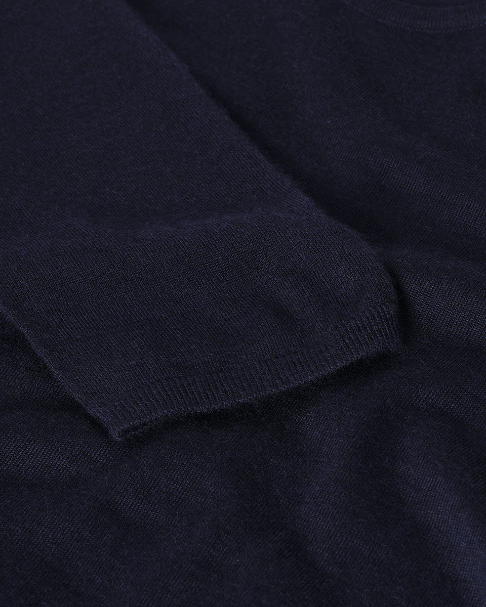 Model wears Johnstons of Elgin AW25 Women's Knitwear Navy Superfine Cashmere Jumper KAI05318SD7600