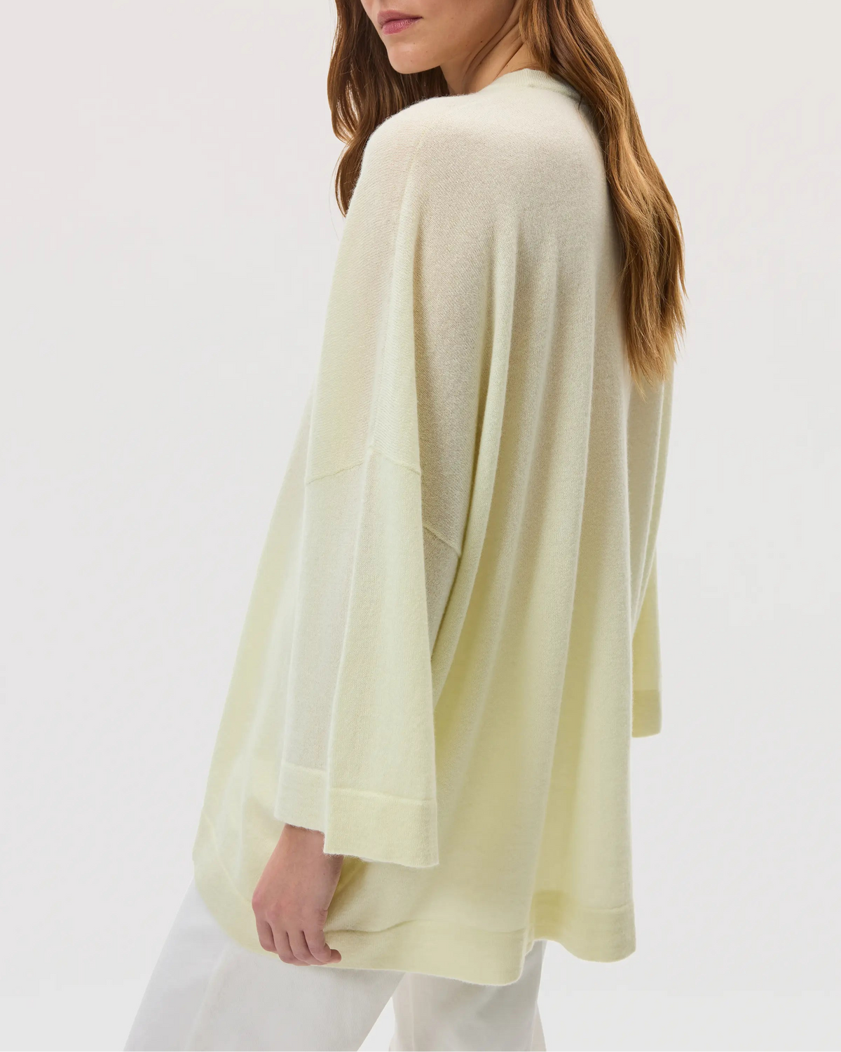 Johnstons of Elgin SS25 Women's Knitwear Lemon Relaxed Featherlight Cashmere Jumper on a pale backdrop KAP05426SA0145