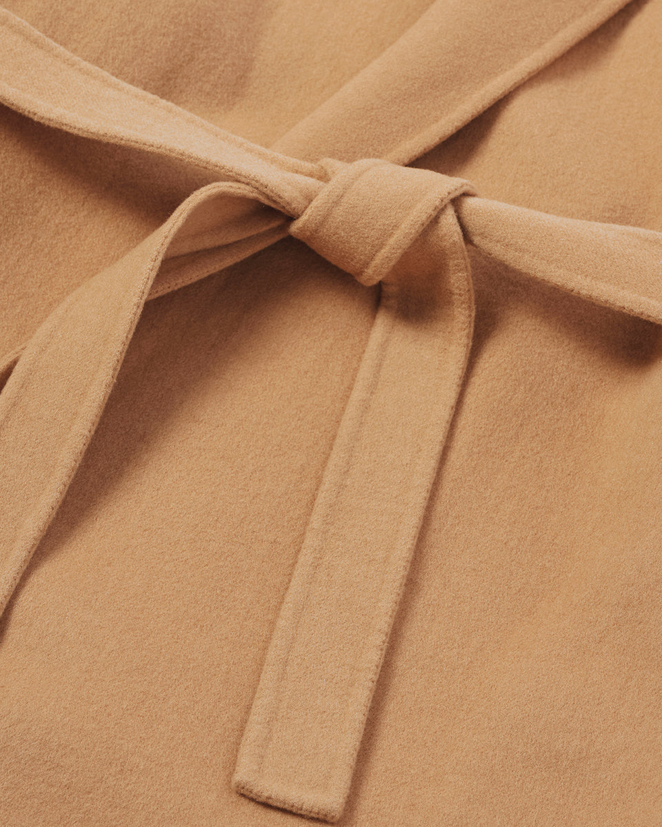 Model wears Johnstons of Elgin Women's Tailoring Camel Camel Cashmere Wrap Coat Front View TA000621RU7397