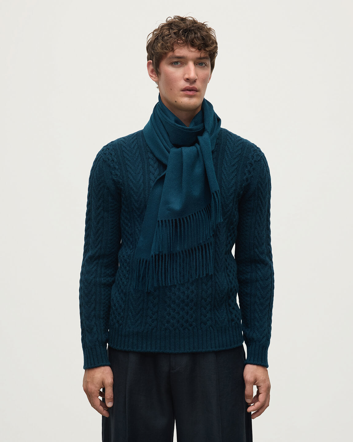 Model wears Johnstons of Elgin AW25 Woven Accessories Bottle Green Bottle Wide Cashmere Scarf WA000057SC7319ONE