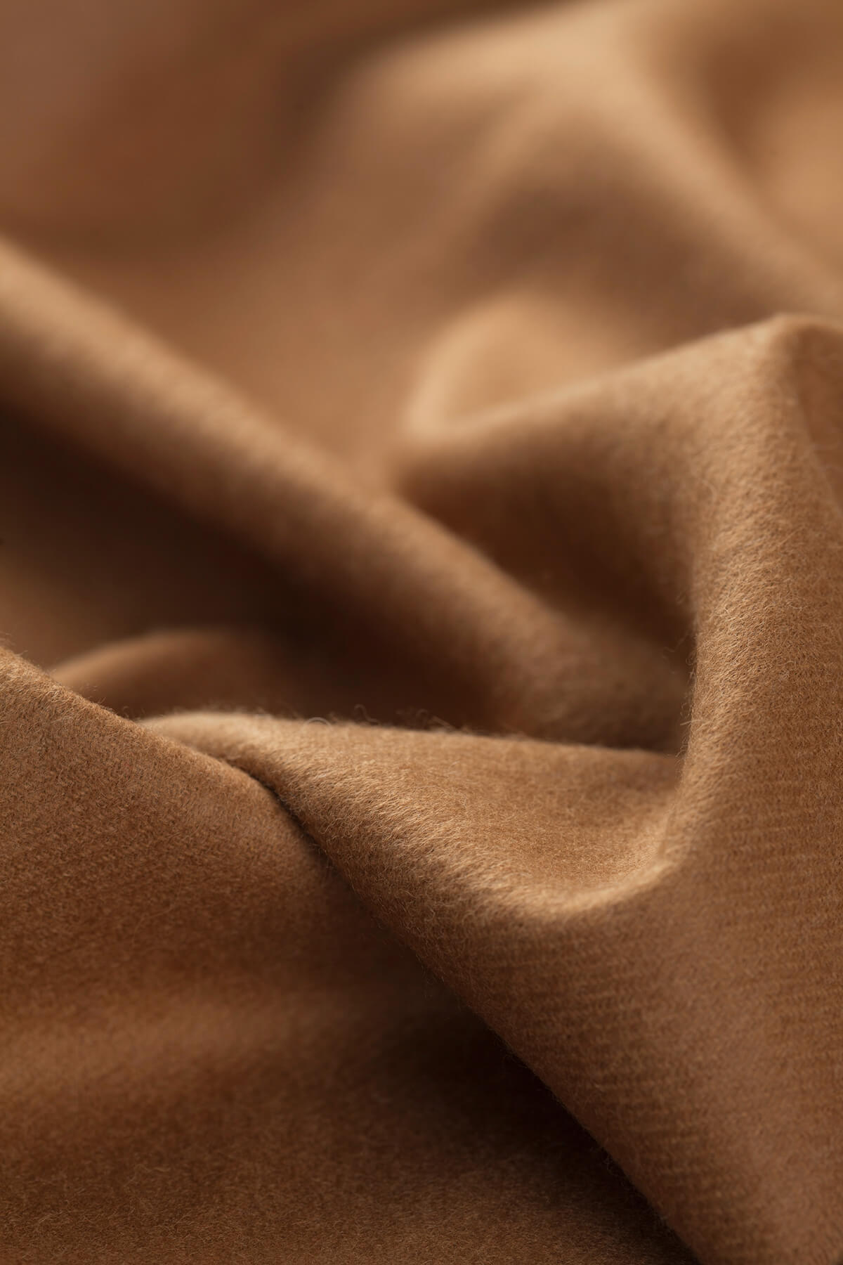 Detail of Johnstons of Elgin Pure Vicuña Stole on a grey background WR000024SB3022N/A