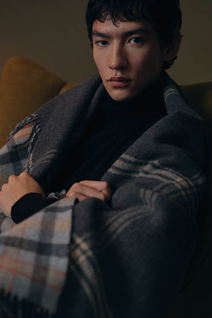 The Alexander Johnston Anniversary Blanket from Johnstons of Elgin in shades of grey, amber and blue WDC01946RU769500