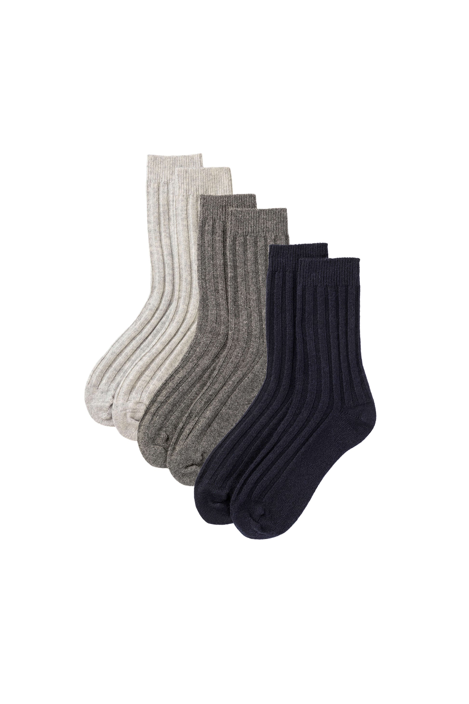 Johnstons of Elgin set of three pairs of cashmere socks in navy, light grey, and mid grey on a white background 2025GIFTSET4A