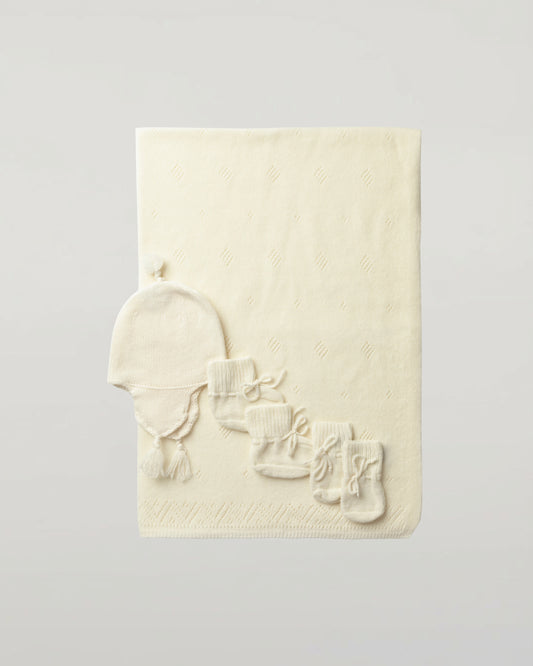 Johnstons of Elgin’s Gift Set includes our Cashmere Pointelle Baby Blanket, Hat, Mittens & Booties in Ecru on a white background AW21GIFTSET18A