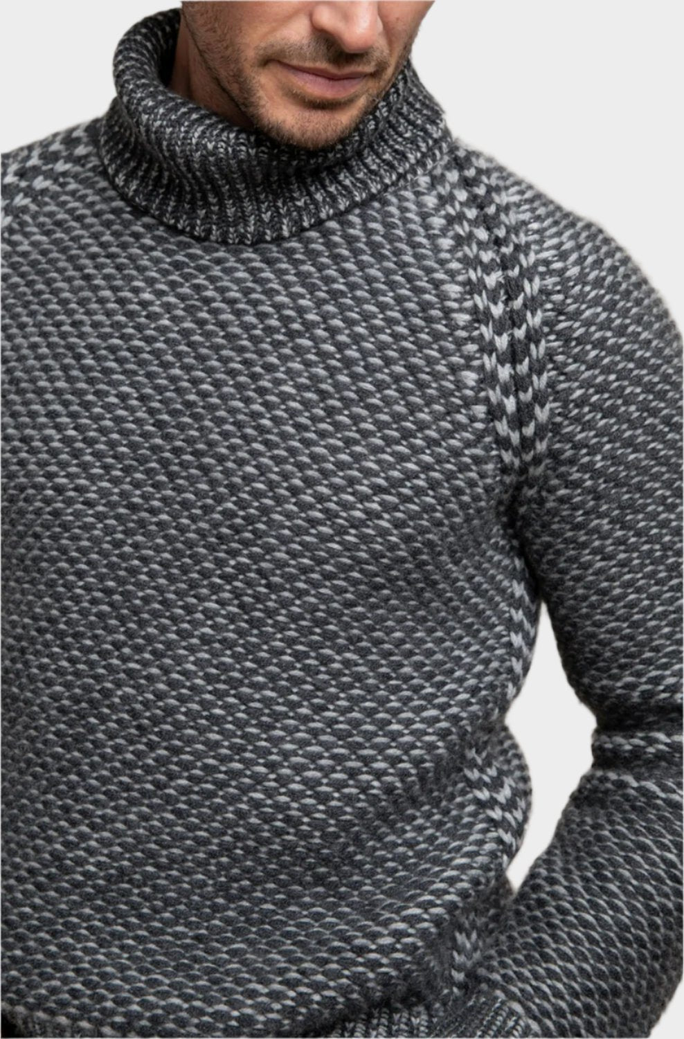 Johnstons of Elgin Men’s Cashmere Float Stitch Jumper in Granite & Silver on a model against a grey background KAB04915Q22614