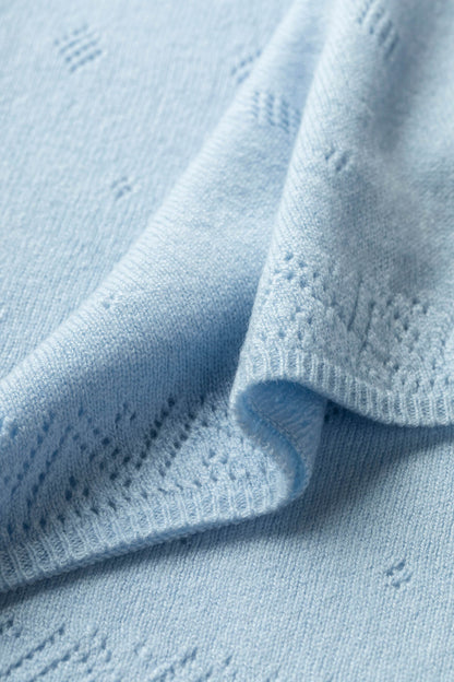 Johnstons of Elgin’s Gift Set includes our Cashmere Pointelle Baby Blanket, Hat, Mittens & Booties in Powder Blue AW21GIFTSET18C