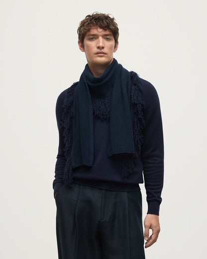 Model wears Johnstons of Elgin green and navy fringed cashmere scarf HAA03529Q25309ONE