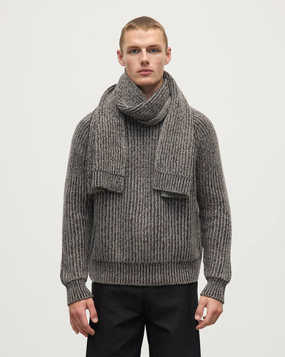 Model wears Johnstons of Elgin AW25 Knitted Accessories Peregrine Donegal Cashmere Brown Knitted Scarf HAC03530Q25314ONE