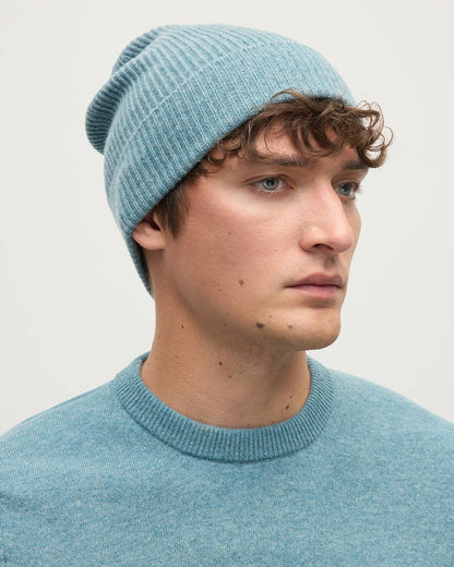 Model wearing Johnstons of Elgin AW25 Knitted Accessories Seascape Slouchy Cashmere Beanie HAE03325HC0038ONE