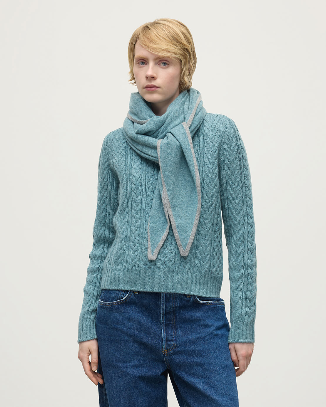 Model wears Johnstons of Elgin AW25 Knitted Accessories Seascape & Light Grey Gauzy Cashmere Green Diamond Scarf HAE03401Q25329ONE