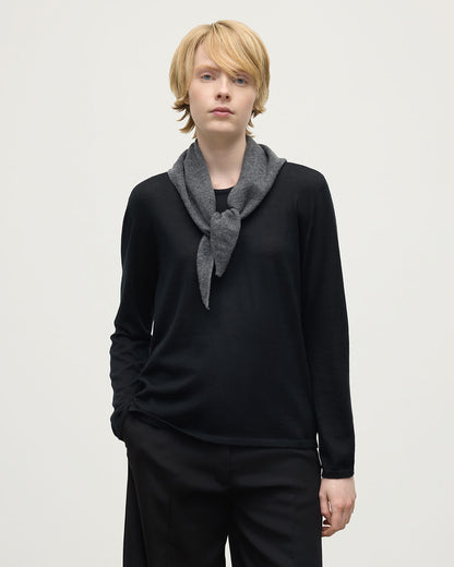Model wearing Johnstons of Elgin AW25 Knitted Accessories  Gauzy Cashmere Grey Triangle Neck Tie with black cashmere sweater HAE03430HA4181ONE