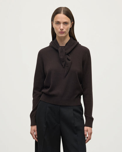 Model wearing Johnstons of Elgin Molasses brown cashmere neck tie, worn with a dark brown cashmere sweater HAE03430SB7290ONE