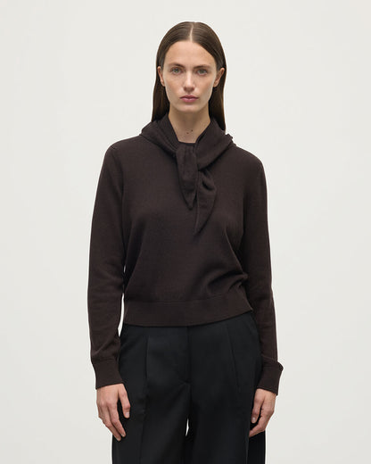 Model wearing Johnstons of Elgin Molasses brown cashmere neck tie, worn with a dark brown cashmere sweater HAE03430SB7290ONE