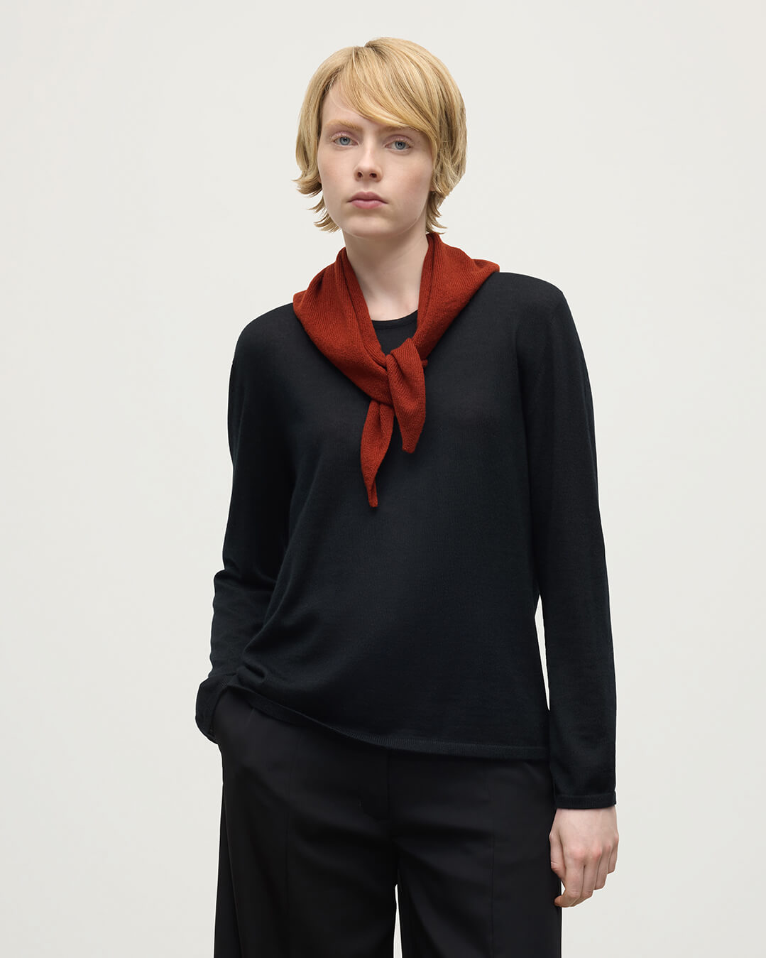 Model wears Johnstons of Elgin Red cashmere neck tie HAE03430SG4463ONE