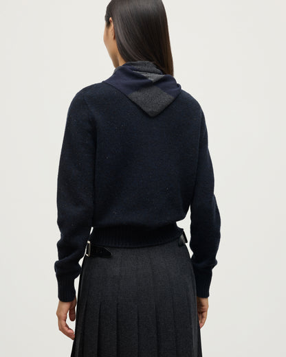 JOHNSTONS OF ELGIN CLAN BANDANA NAVY 100% CASHMERE ON A FEMALE MODEL OVER A NAVY MARL CASHMERE SWEATER HAP03612JU1613ONE