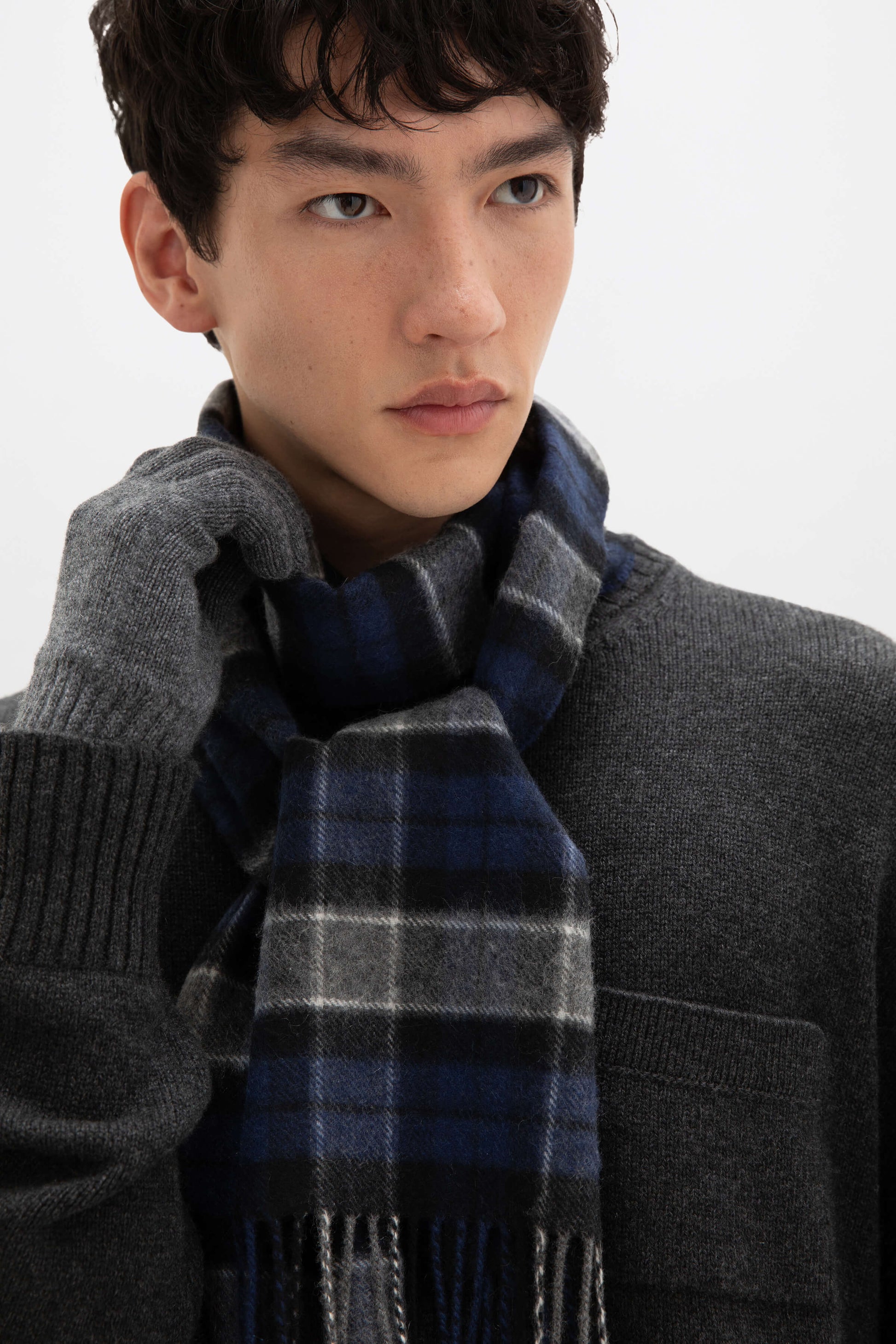 Johnstons of Elgin Tartan Cashmere Scarf in Menteith on a male model WA000016KU0127ONE