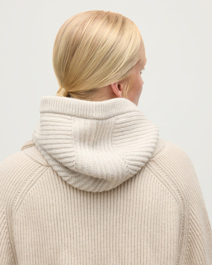 NEVIS HOOD NATURAL 100% CASHMERE ON A MODEL WEARING A NATURAL MARL CASHMERE SWEATER & SHAWL COLLAR CARDIGAN HAY03615Q26169ONE