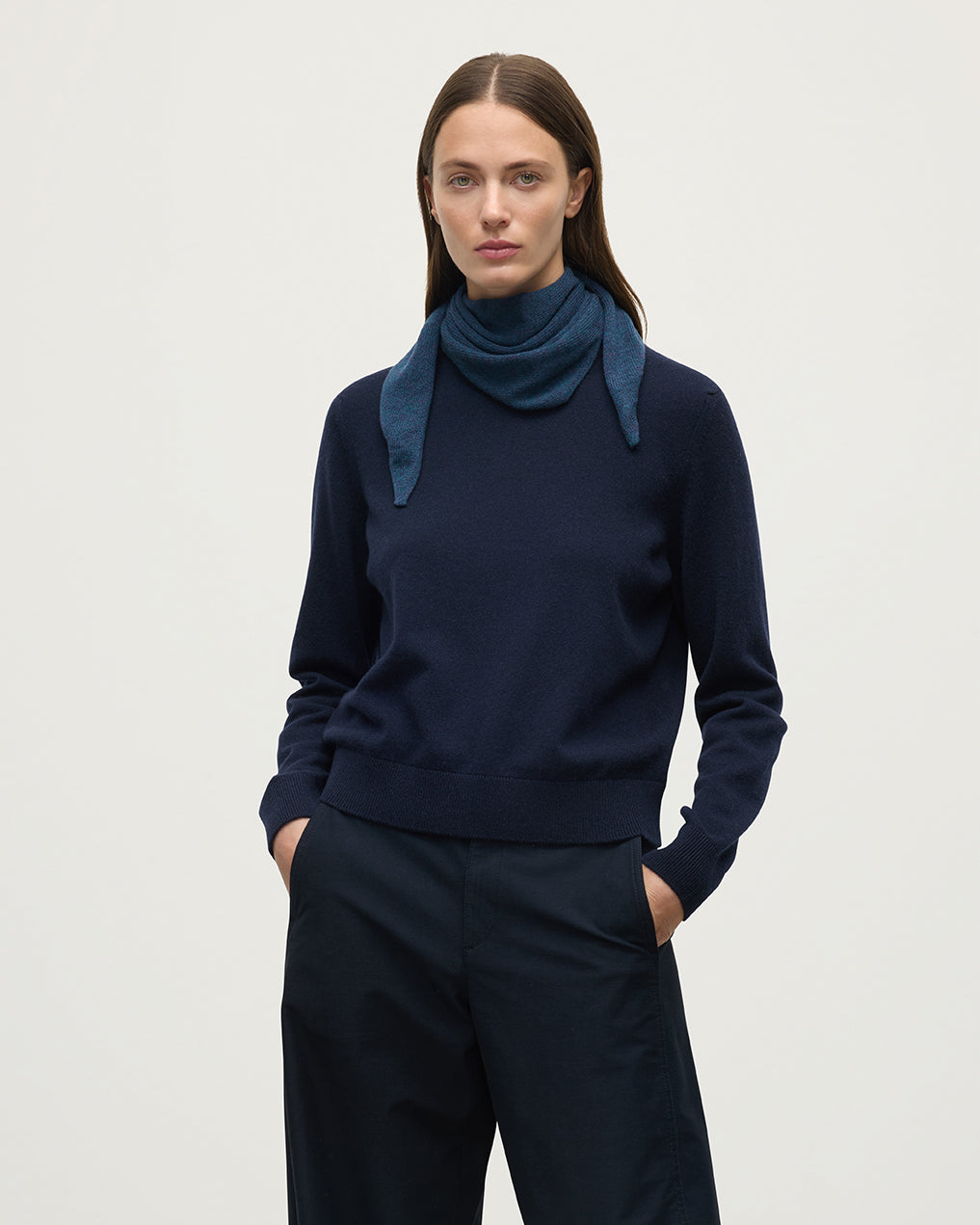 Model wears Johnstons of Elgin Heather Navy Cashmere Neck Tie HAE03430HD7321ONE