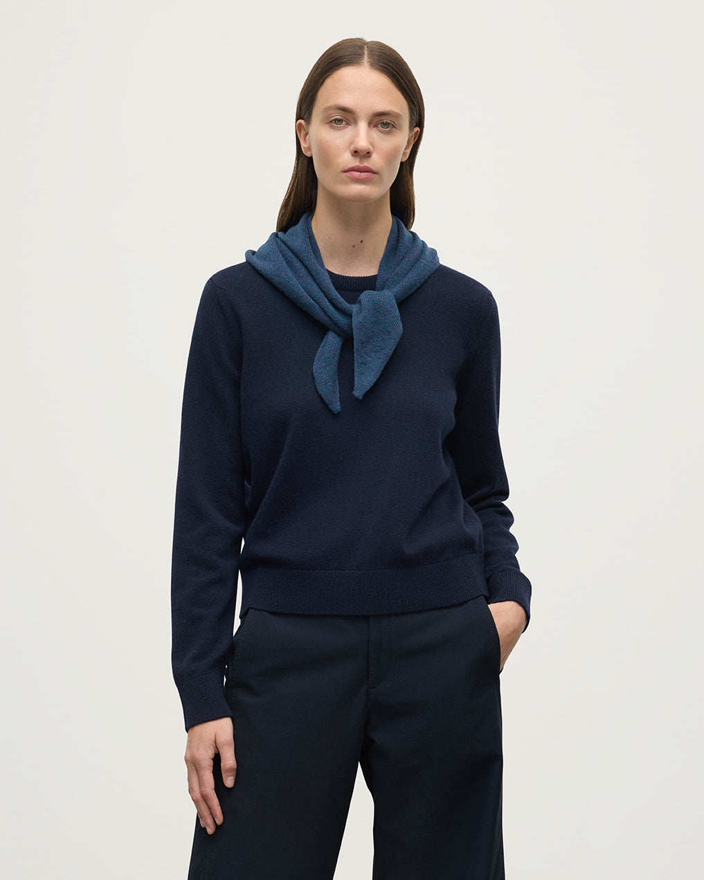 Model wears Johnstons of Elgin Heather Navy Cashmere Neck Tie HAE03430HD7321ONE