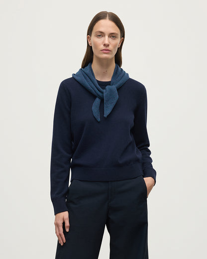 Model wears Johnstons of Elgin Heather Navy Cashmere Neck Tie HAE03430HD7321ONE