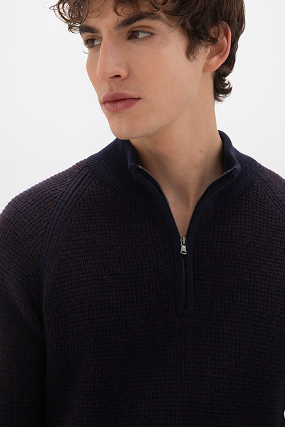 Johnstons of Elgin men's textured zip neck sweater in malt marl  worn by a model on a white background KAA05043Q24457