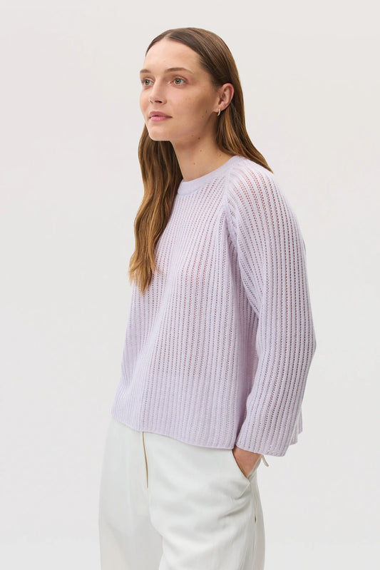 Model wearing Johnstons of Elgin SS25 Women's Knitwear Lavender Mesh Rib Cashmere Jumper against a white backdrop KAA05430HD0086