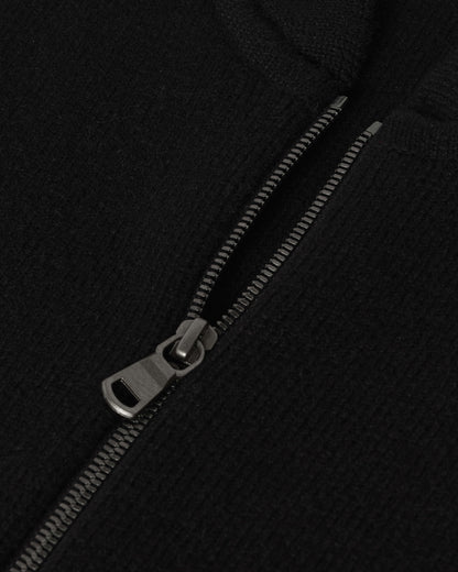 Johnstons of Elgin AW25 Men's Knitwear Black Cashmere Milano Stitch Zip Jacket with black trousers and a white t-shirt  KAA05443SA0900