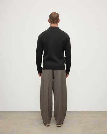 Back view model wearing Johnstons of Elgin AW25 Men's Knitwear Black Milano Ribbed Zip Black Cashmere Cardigan KAA05443SC7330