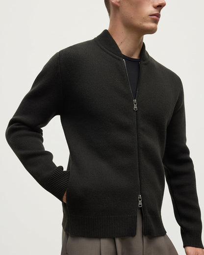 Close Up model wearing Johnstons of Elgin AW25 Men's Knitwear Black Milano Ribbed Zip Black Cashmere Cardigan KAA05443SC7330