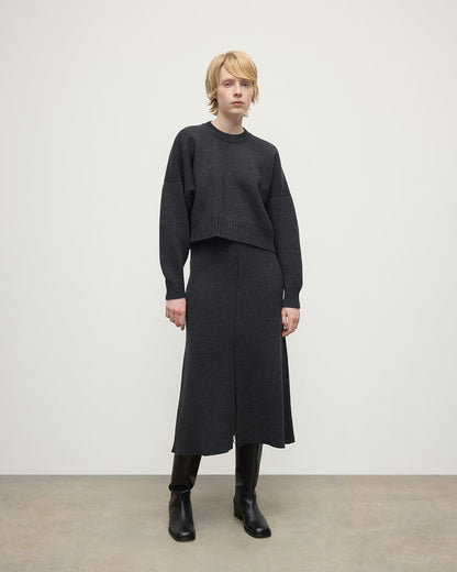 Johnstons of Elgin AW25 Model wearing Women's Knitwear Charcoal Cropped Milano Grey Cashmere Jumper Front View  KAA05488HA7165