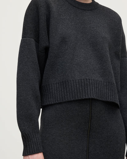 Johnstons of Elgin AW25 Model wearing Women's Knitwear Charcoal Cropped Milano Grey Cashmere Jumper Close Up  KAA05488HA7165