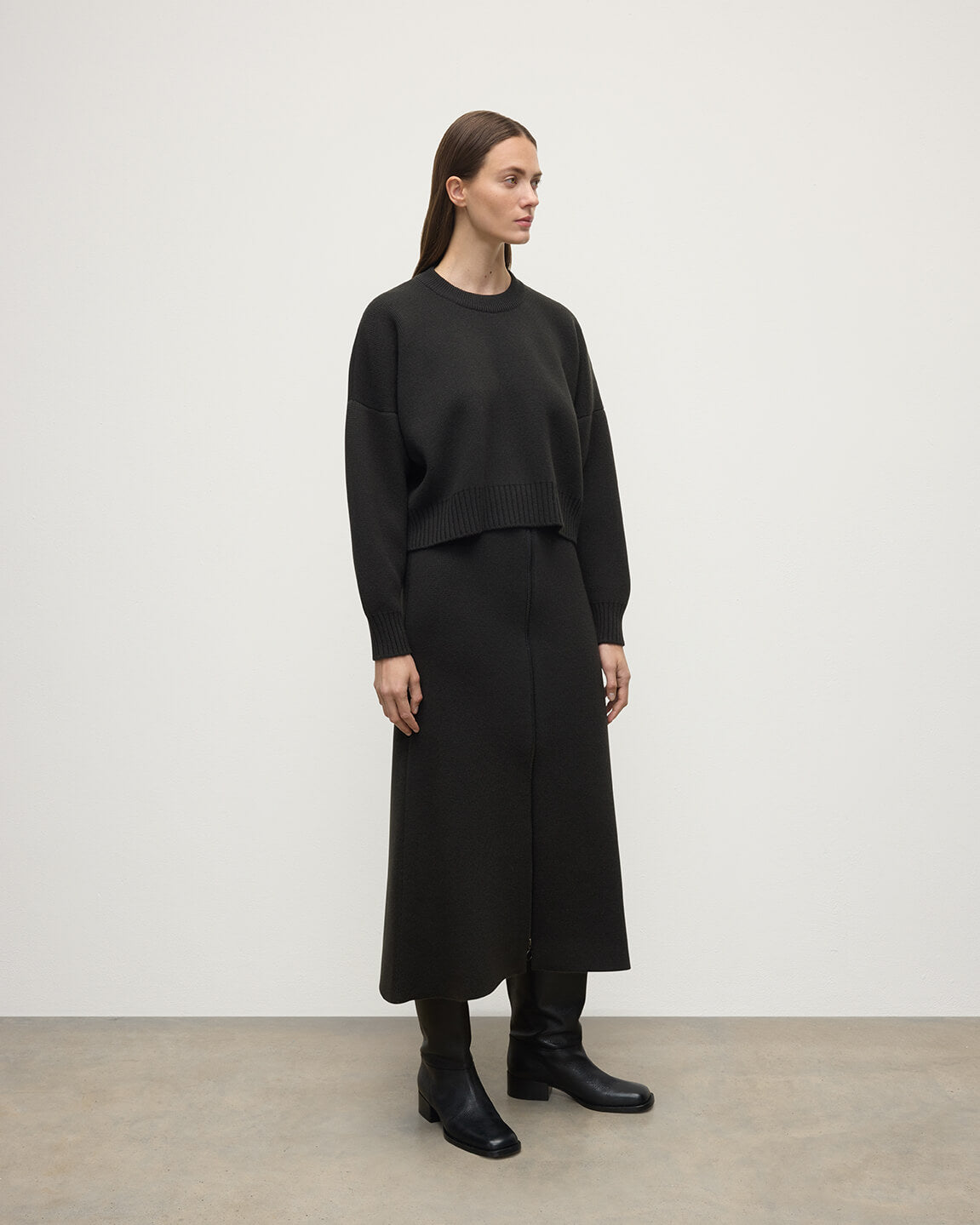 Johnstons of Elgin AW25 Model wearing Women's Knitwear Black Cropped Milano Grey Cashmere Jumper Front View  KAA05488SC7330