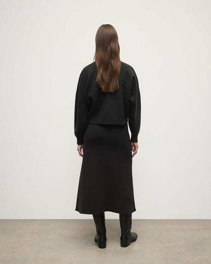 Johnstons of Elgin AW25 Model wearing Women's Knitwear Black Cropped Milano Grey Cashmere Jumper Front View  KAA05488SC7330