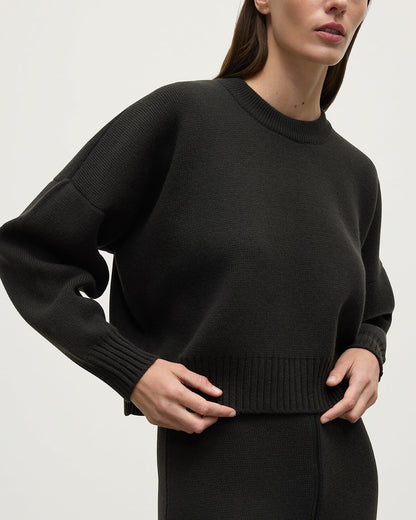 Model wearing Johnstons of Elgin AW25 Women's Knitwear Iron Cropped Milano Grey Cashmere Jumper close up KAA05488SC7330