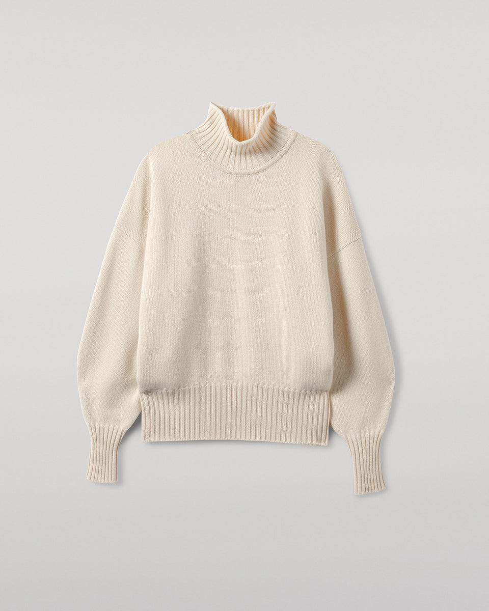 Johnstons of Elgin AW25 Women's Knitwear Champagne High Neck Cream Cashmere Jumper close up  KAA05585SA0502