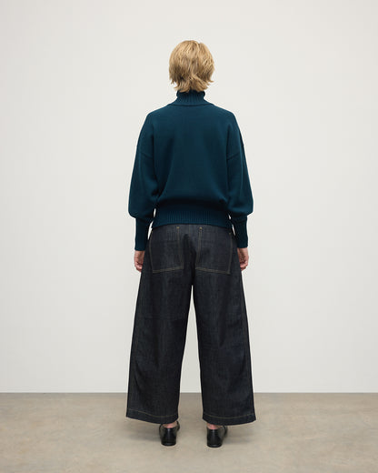 Model wearing Johnstons of Elgin AW25 Women's Knitwear Bottle Green High Neck Green Cashmere Jumper Back View KAA05585SC7341