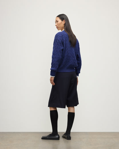 BACK OF WOMENS KYLESKU DEEP VEE SWEATER BLUE ON A MODEL KAA05728HD4490