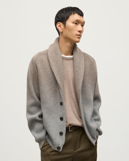 MALE MODEL WEARING JOHNSTONS OF ELGIN PIONEER SHAWL CARDIGAN GREY 100% CASHMERE WITH OLIVE GREEN CHINOS, WHITE T-SHIRT KAA05750Q25948