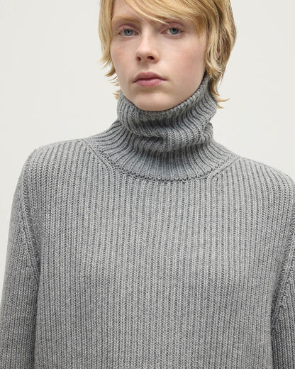 Model wears Johnstons of Elgin AW25 Women's Knitwear Light Grey Roll-Collar Grey Cashmere Jumper close up KAB05492HA0308