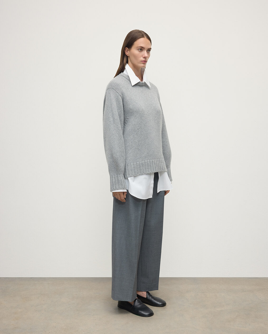 Model wearing Johnstons of Elgin AW25 Women's Knitwear Light Grey Relaxed Grey Cashmere Jumper Side View KAB05562HA0308