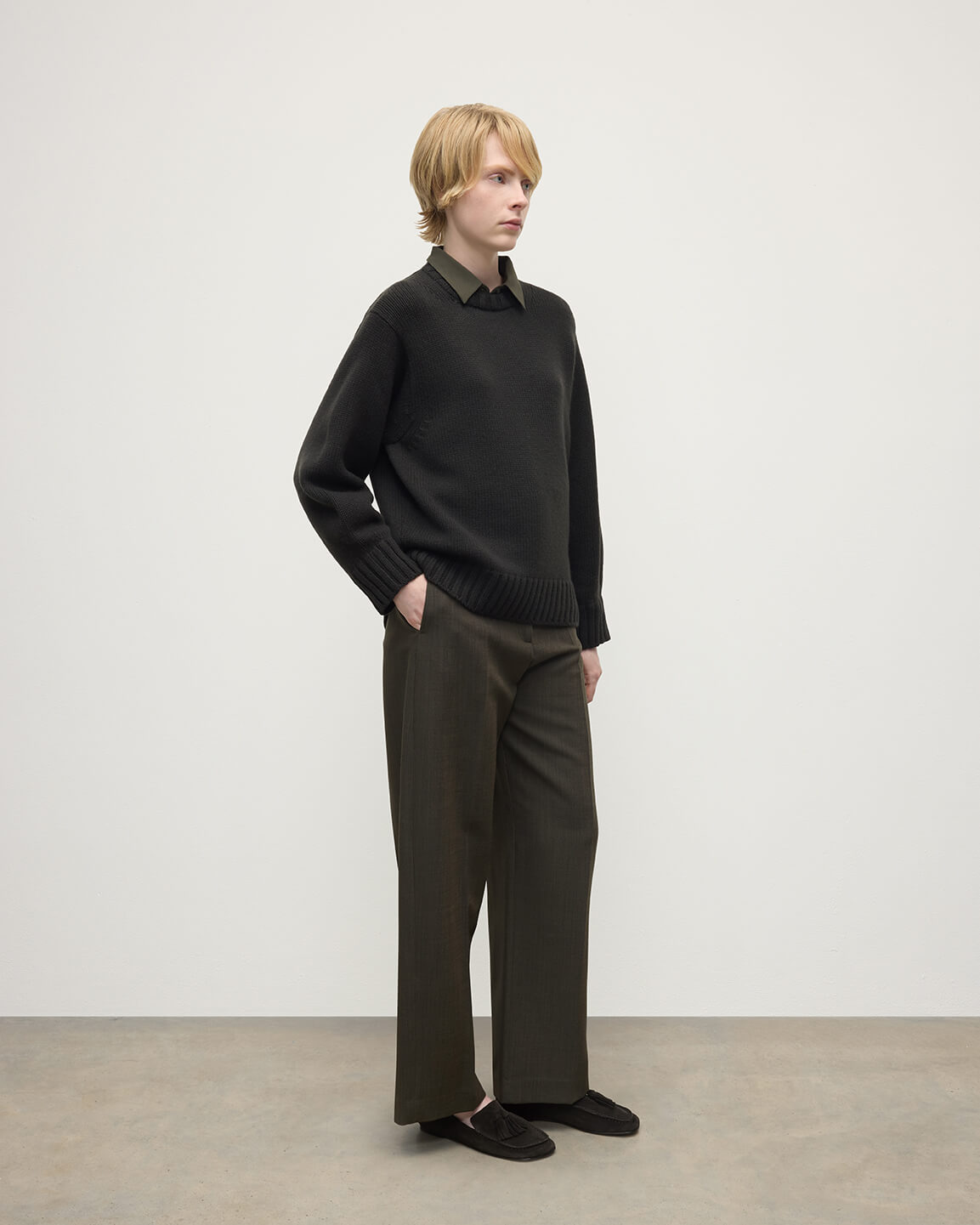 Model wears Johnstons of Elgin AW25 Women's Knitwear Iron Relaxed Grey Cashmere Jumper Side View KAB05562SC7330