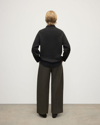 Model wears Johnstons of Elgin AW25 Women's Knitwear Iron Relaxed Grey Cashmere Jumper Back View KAB05562SC7330