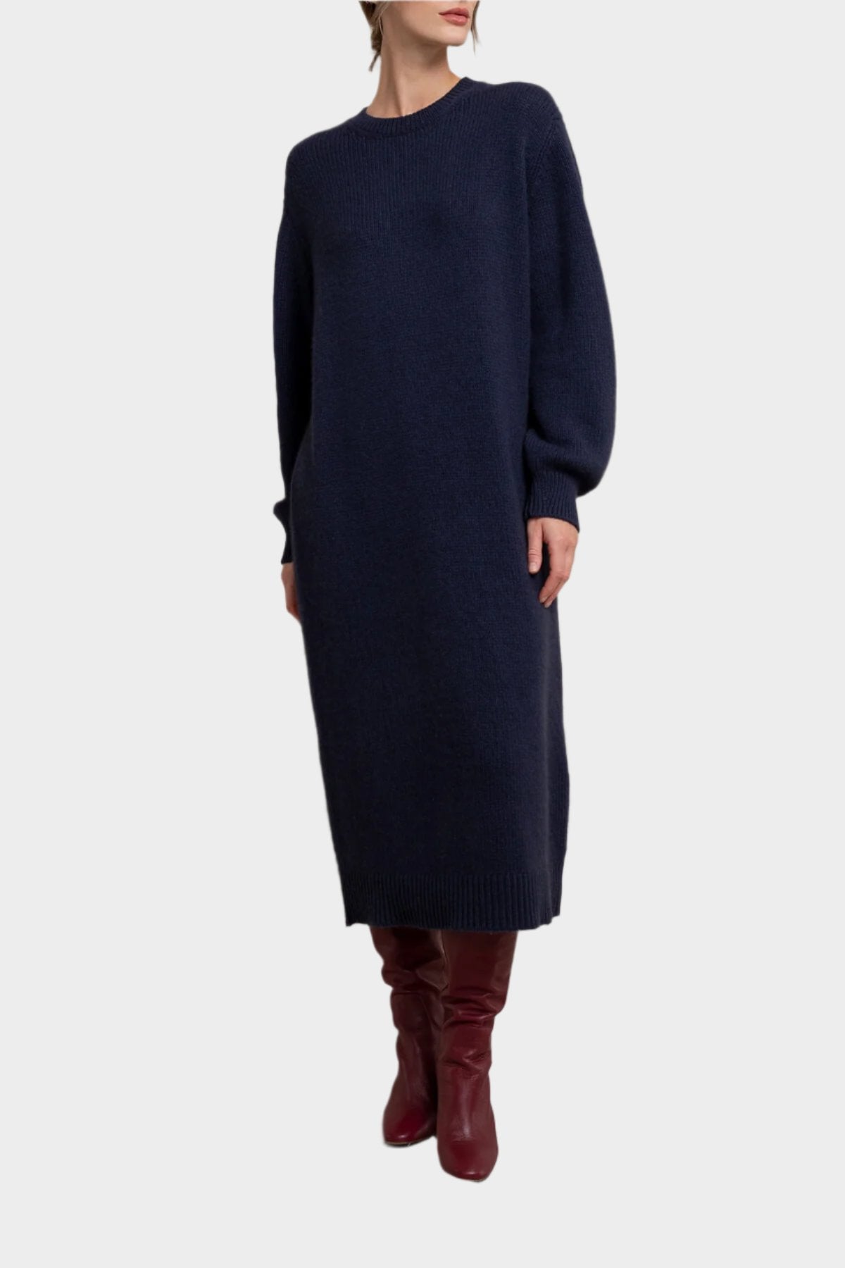 Johnstons of Elgin Women’s Cashmere Sweater Dress in Navy a grey background KAC05045SD0707