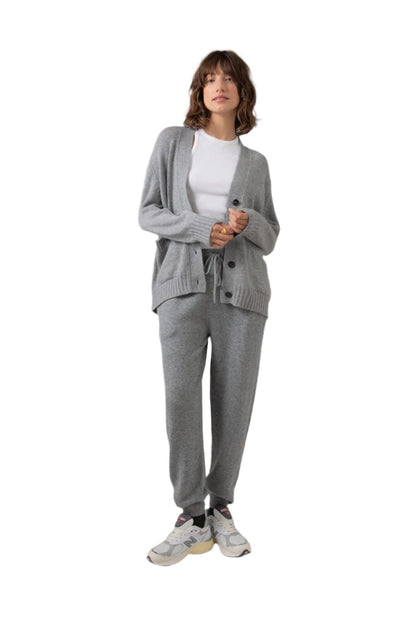 Johnstons of Elgin Women's Relaxed Fit Cashmere Cardigan in Light Grey worn with a White T-Shirt and Grey Cashmere Joggers KAC05087HA0308