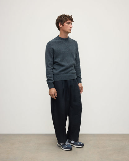 Side view of a model wearing Johnstons of Elgin AW25 Men's Knitwear Storm Donegal Donegal Cashmere Marl Jumper KAC05287006336